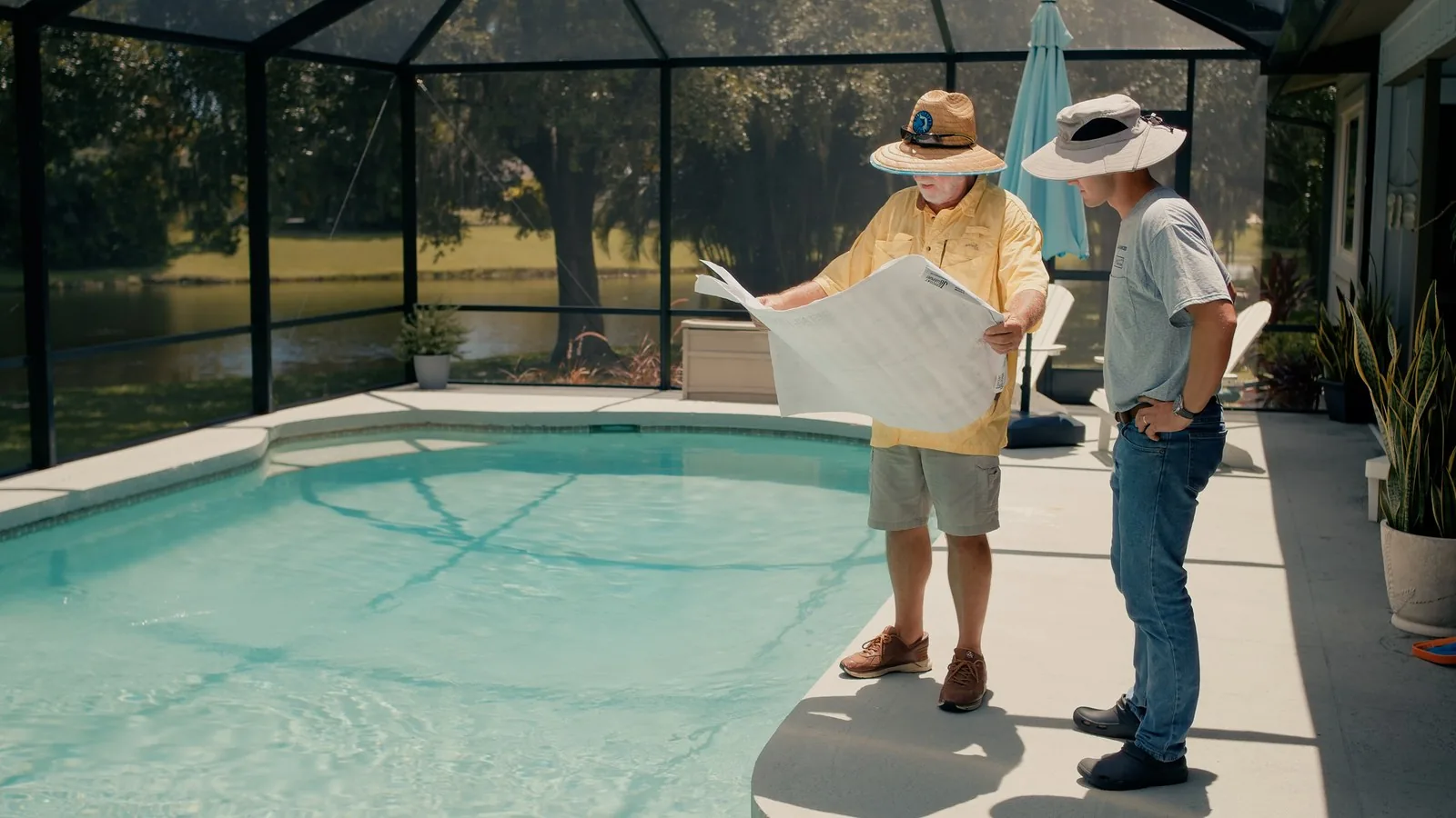 Advanced Leak Detection technician walking a homeowner through a detailed pool leak inspection report