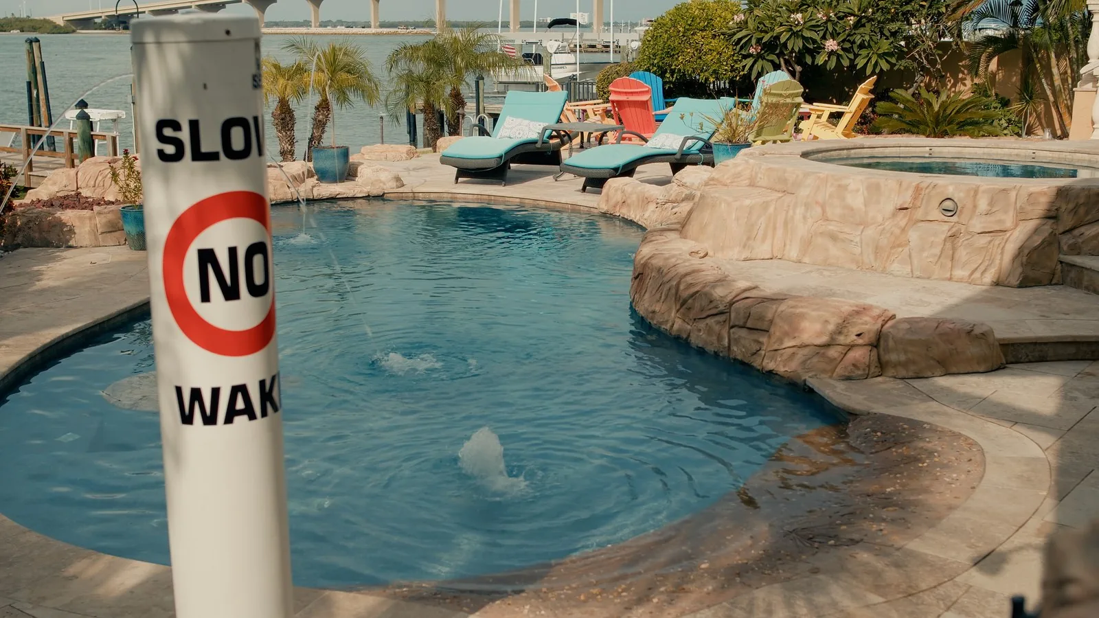 Leak detection testing in progress at a waterfront pool on the Florida Gulf Coast