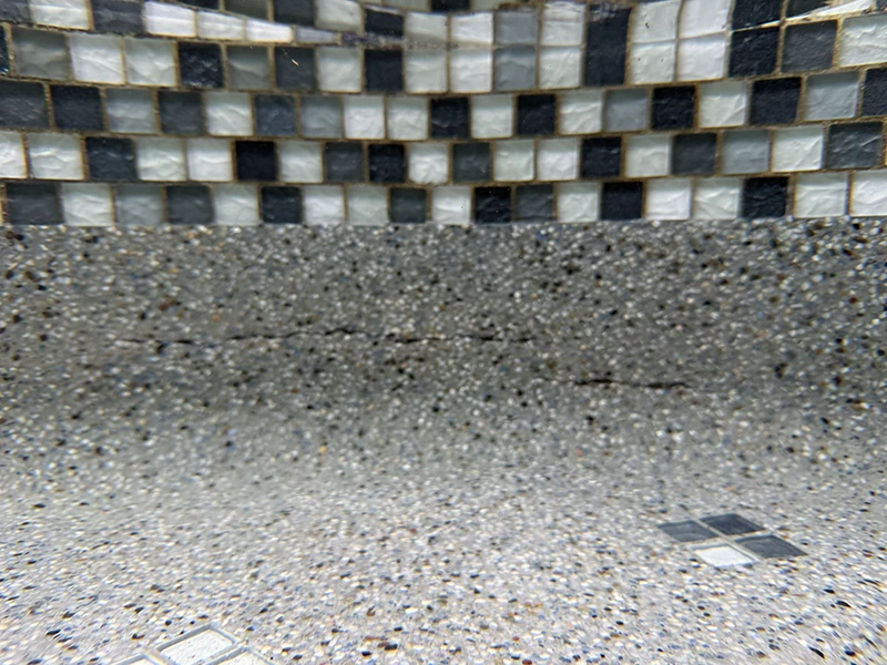 Keyed Gasket-Way crack repair — structural pool crack before treatment, Advanced Leak Detection Tampa Bay