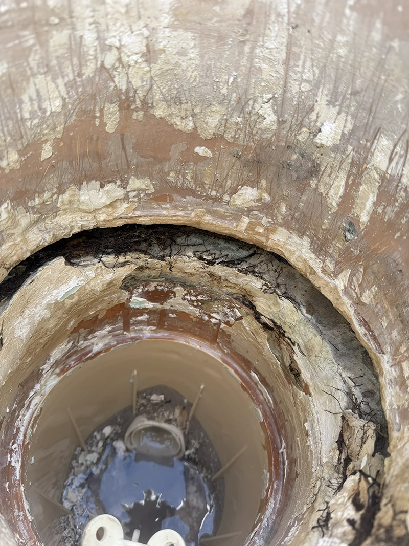 Leaking pool skimmer before repair by Advanced Leak Detection — cracked housing causing steady water loss