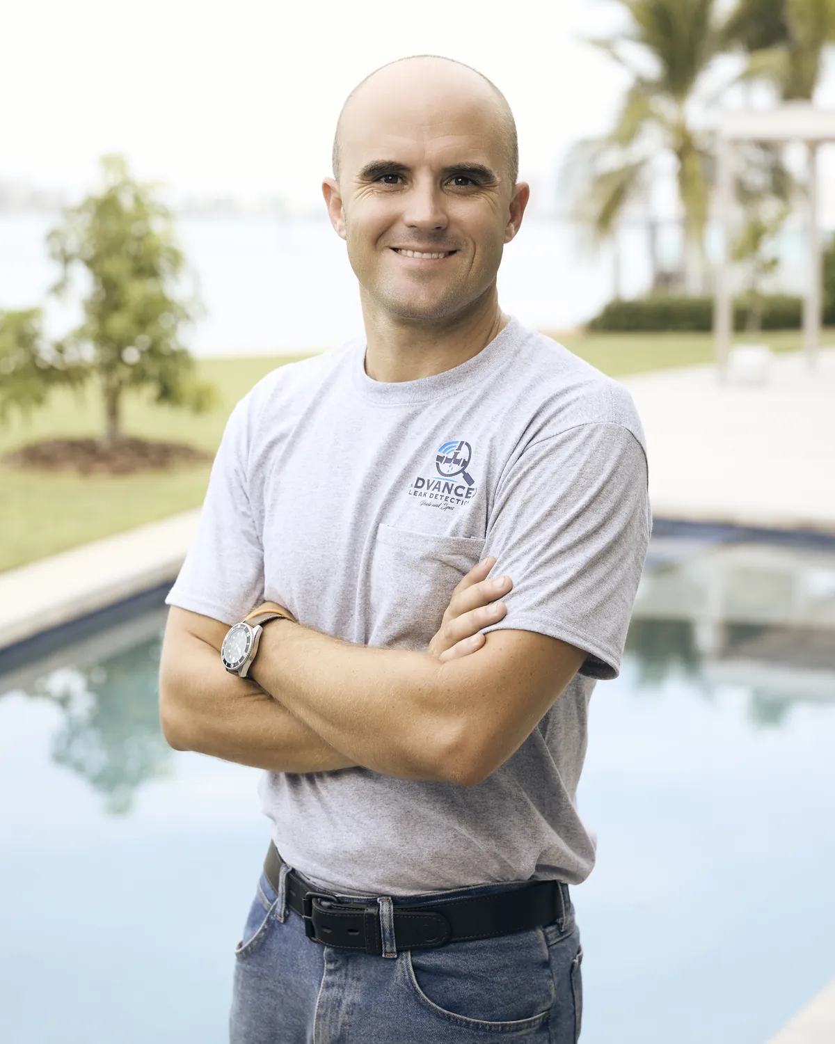 Troy of Advanced Leak Detection standing poolside during a leak detection visit.